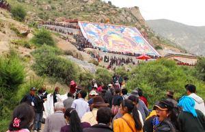 worshipping the buddha on tangka